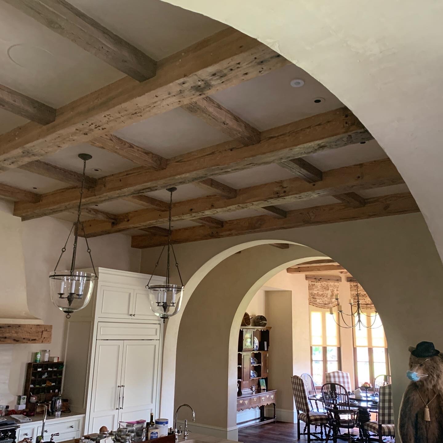 Lime plaster wall in residential interior light, showing the long-life mineral finish that anchors the cost argument, from the studio's project library